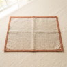 Linen Feeding Mat in heavy washed linen with a narrow terracotta binding