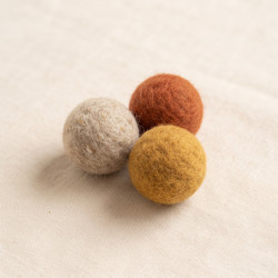 Felted Wool Ball Trio: three hand-felted wool balls in oat, rust and ochre
