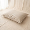 Washed Linen Cushion Bed, a low flat cushion bed with an oat washed linen cover